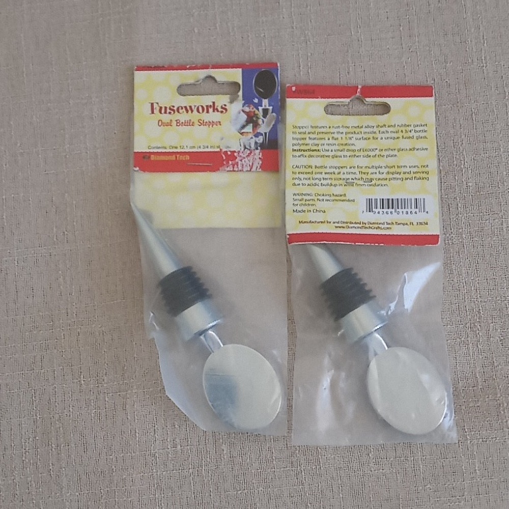 Wine bottle stoppers. Pair of 2.
